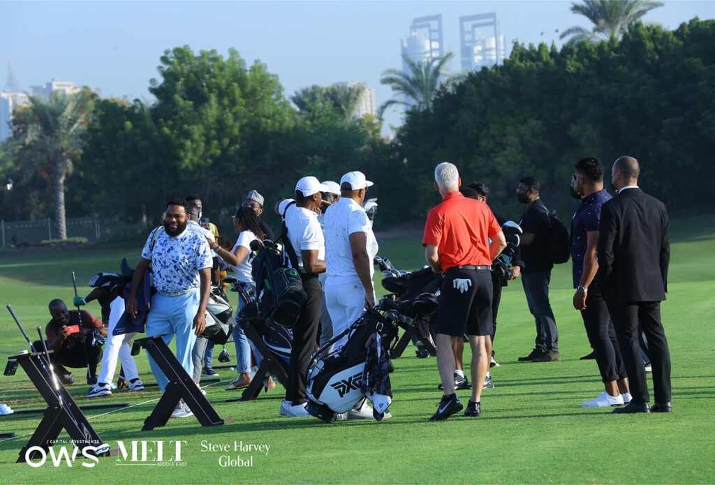 Golfers carrying their clubs and gathering together