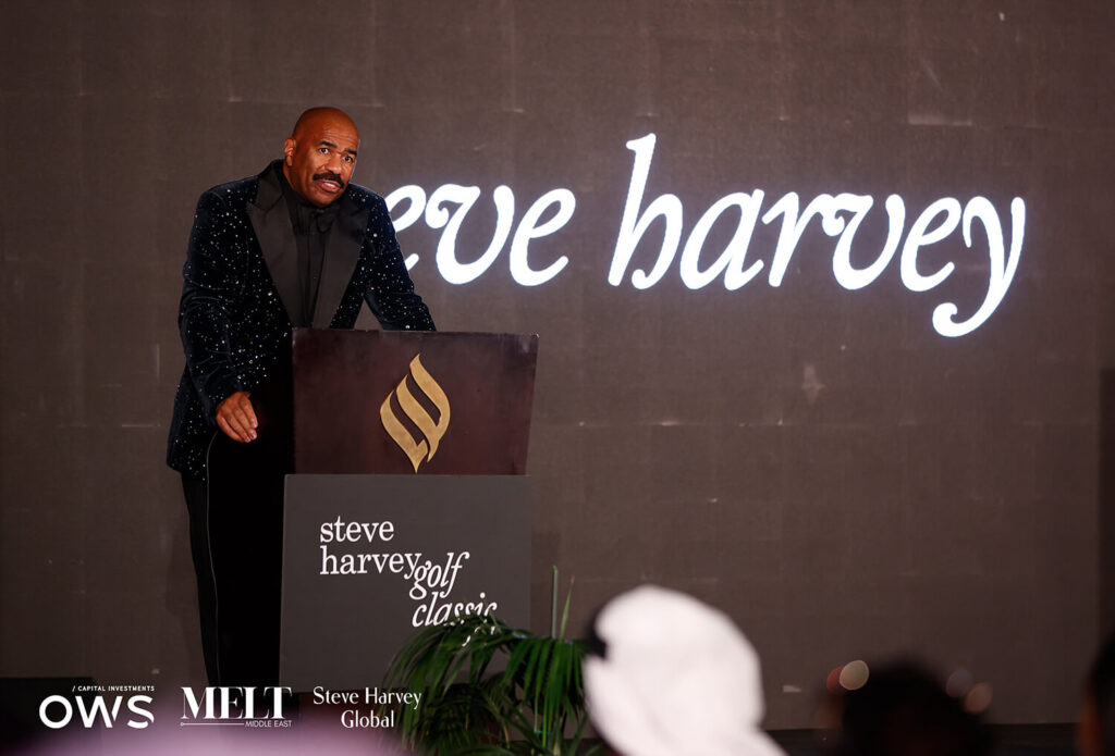 Image of Steve Harvey at the podium for the dinner